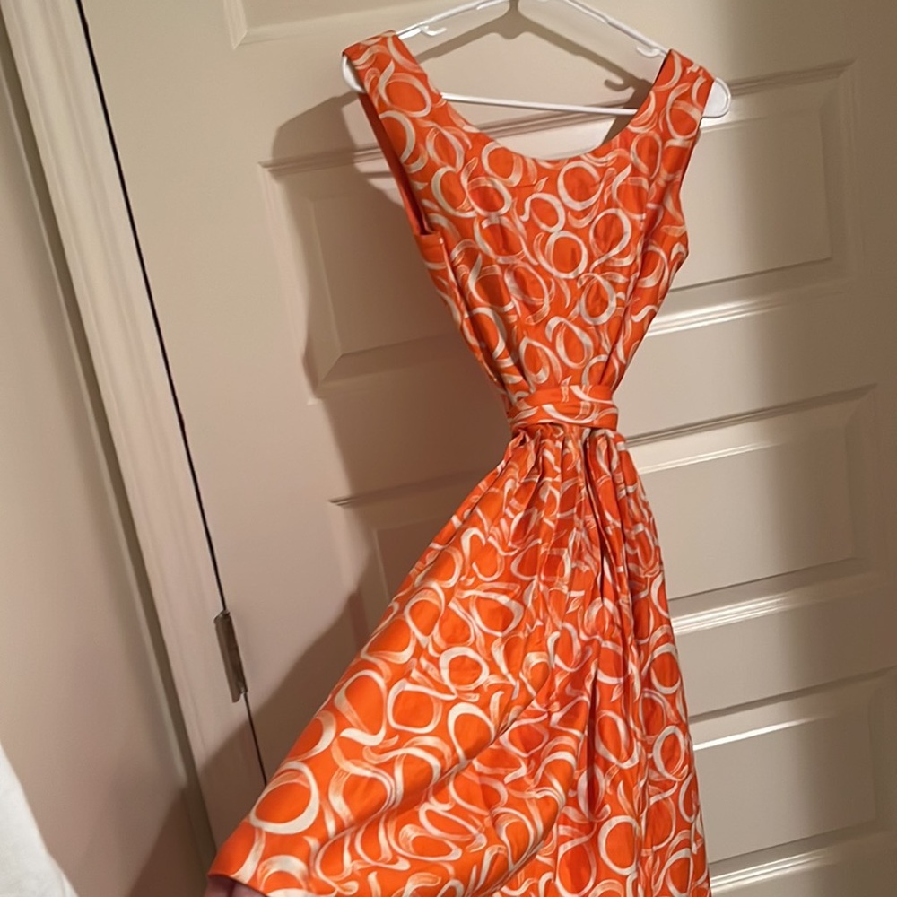 Vintage, vibrant 1950s tea-length dress with long sash